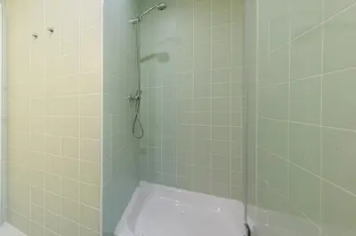 a bathroom with a shower with a toilet at Belly Angel - Porto Historic Center in Porto
