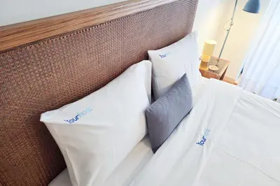 a room with a table and a basket and a door at Charming retreat near Boavista with elevator in Porto