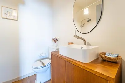 a bathroom with a bath tub with a light at Charming retreat near Boavista with elevator in Porto