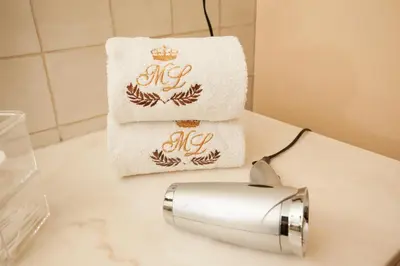 a towel dispenser sitting on a counter with two towels at ML Apartments Story in Porto