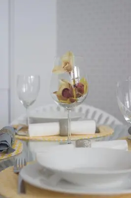 a table with a wine glass filled with fruit and cheese at OHH -Porto 4 you- Deluxe Apartment With Free Parking in Porto