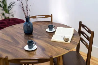 a wooden table with two cups and a book at Apartment Firehouse by Sweet Porto - Free Parking in Porto