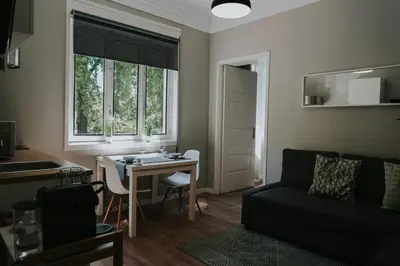 a living room with a table and a couch at Five Seven Nine Apartments in Porto