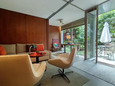 a living room with a couch and a table at Garden House in Porto