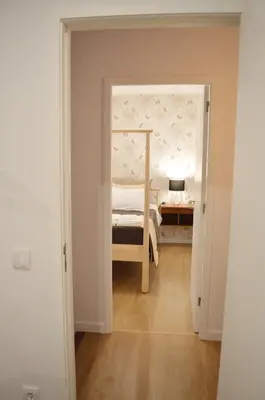a small bedroom with a bed in a room at T2P Félix House in Vila Nova de Gaia