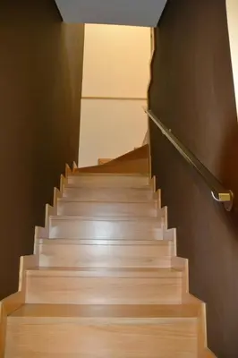 a staircase in a house with wooden floors at Sunrise House in Porto