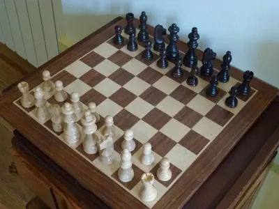 a chess board with chess pieces on it at Canvas Atelier Hostel in Porto