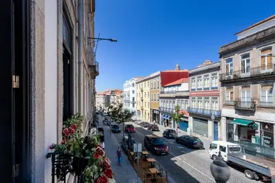 a view of a city street with cars and buildings at Mouzinho 244 - Porto Houses & Suites in Porto