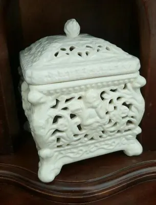 a white cake sitting on top of a table at Our Home City Flat in Porto