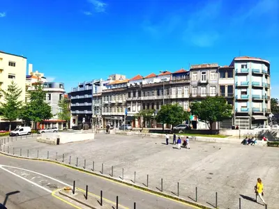 a large plaza in a city with buildings at Turra Residence in Porto