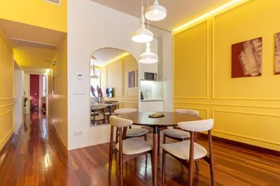 an orange door with the number on it at Myo Design House by LovelyStay in Porto