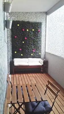 a room with a wall with flowers on it at Bombarda House & Home in Porto