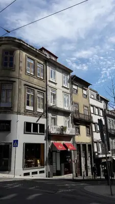 a group of buildings on a city street at OPorto Histórico - Galerias in Porto