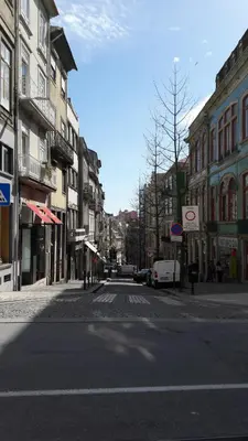 an empty street in a city with buildings at OPorto Histórico - Galerias in Porto