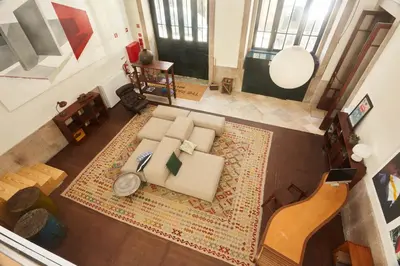 an overhead view of a living room with a couch at The Passenger Hostel in Porto