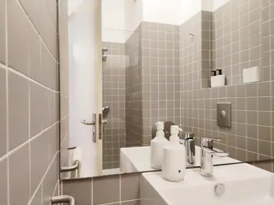 a bathroom with a sink and a mirror at E36 - ideal for families - large areas in Porto