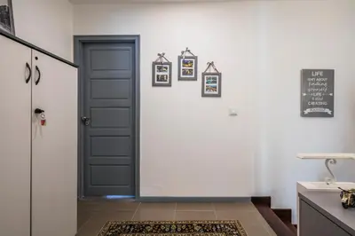 a door leading into a kitchen with pictures on the wall at Apartamento À Francos Balcony in Porto