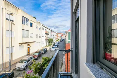 a view from a window of a street with parked cars at Apartamento À Francos Gyn Lovers in Porto
