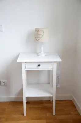 a white table with a lamp on top of it at Porto Smart Apartments - Downtown in Porto