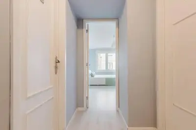 an open door to a room with a bedroom at Lima House in Porto