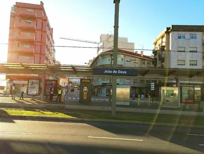 a sign for a bus stop on a city street at Always Porto in Vila Nova de Gaia