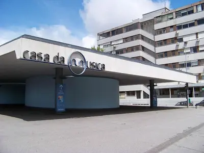 a building with a sign on the top of it at Music Relaxing Apt with bikes, terrace & parking in Porto