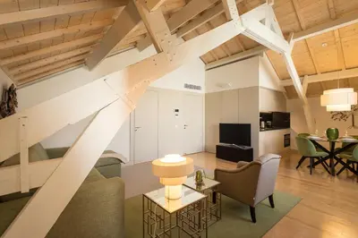 a living room with a couch and a table at Santa Catarina Apartments in Porto