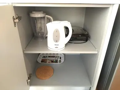 a drawer filled with utensils in a kitchen at Lusitania Garden Apartment - Jardim Privado in Porto