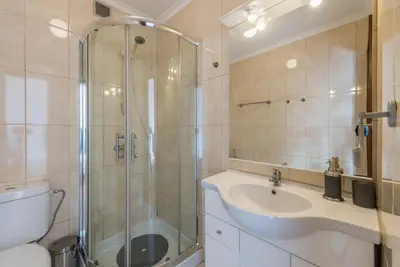 a bathroom with a shower and a sink and a toilet at GuestReady - Porto Magic View in Vila Nova de Gaia