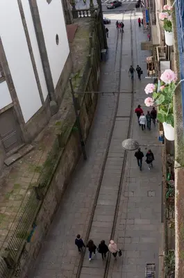 a group of people walking down a street at Oporto Centre Clean & Cozy Apt 2 in Porto