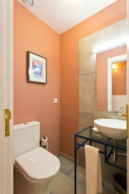 a table with a picture frame and cups on it at Oporto Centre Clean & Cozy Apt 1 in Porto