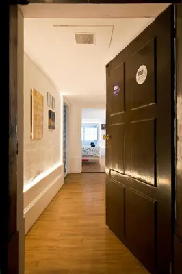 an open door in a room with a hallway at Oporto Blue Picaria - Unique Citycenter Apartment in Porto