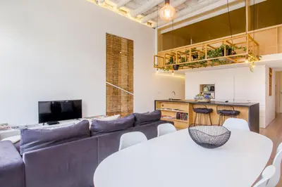 a living room with a couch and a table at OHH - Mouzinho Deluxe Apartment in Porto