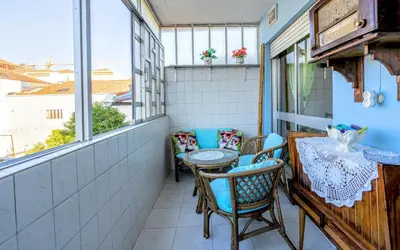a dining room table with a table cloth on it at Apartment Rustic Oporto in Porto