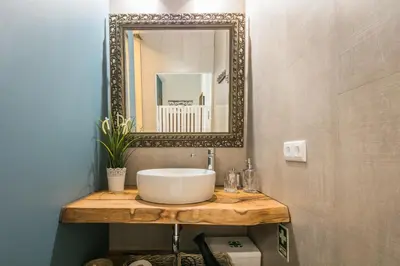 a bathroom with a sink and a mirror at Merc Porto Ribeira's Up place in Porto