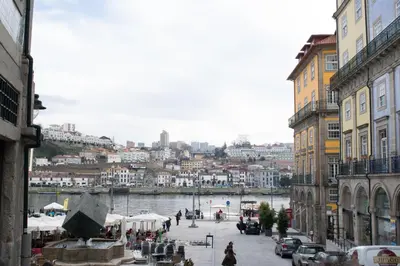 a view of a city with a river and buildings at Merc Porto Ribeira's Up place in Porto