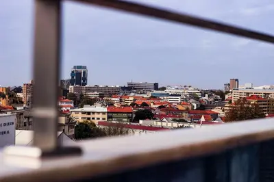 a view of a city from a window at Apartamento da Lapa in Porto