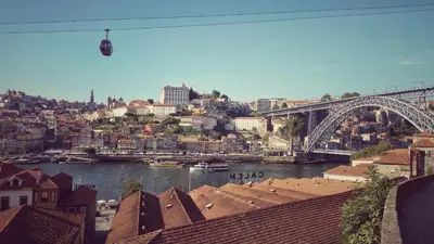 a view of a city with a bridge and a river at Casinha Miradouro in Vila Nova de Gaia