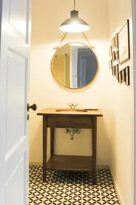 a bathroom with a sink and a mirror at Mo House in Porto