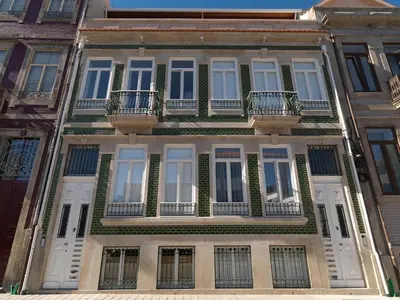 a large building with balconies on the side of it at Oporto Medusa Apartment in Porto