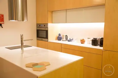 a kitchen with a sink and a counter top at Hello Porto Ceuta Residences in Porto