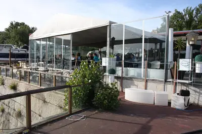 a building with a tent with people in it at Porto Private Yacht- Accommodation Douro River in Porto