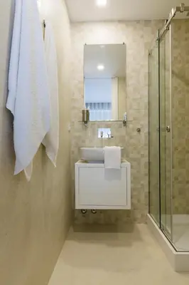 a bathroom with a sink and a shower at Oporto up Town in Porto