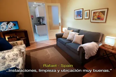 a living room with a couch and a table at LivingPorto Boavista in Porto