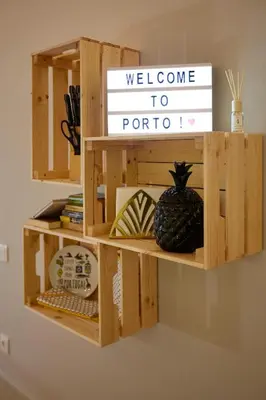 a wooden shelf with a welcome to porto sign at LOFT Sá de Noronha in Porto