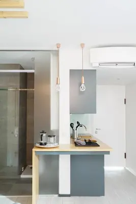 a kitchen with a wooden counter top in a room at 7 Gaia Roaster Apartments in Vila Nova de Gaia