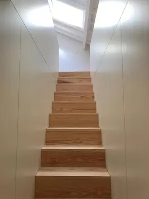 a staircase in a house with a glass wall at Porto Ildefonso II in Porto