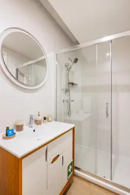 a washer and dryer in a laundry room at BnBird Lifestyle Studio in Porto in Porto