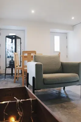 a living room with a couch and a table at Lost Apartments in Porto