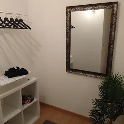 a mirror on a wall in a room at ML Apartments Avenue in Porto